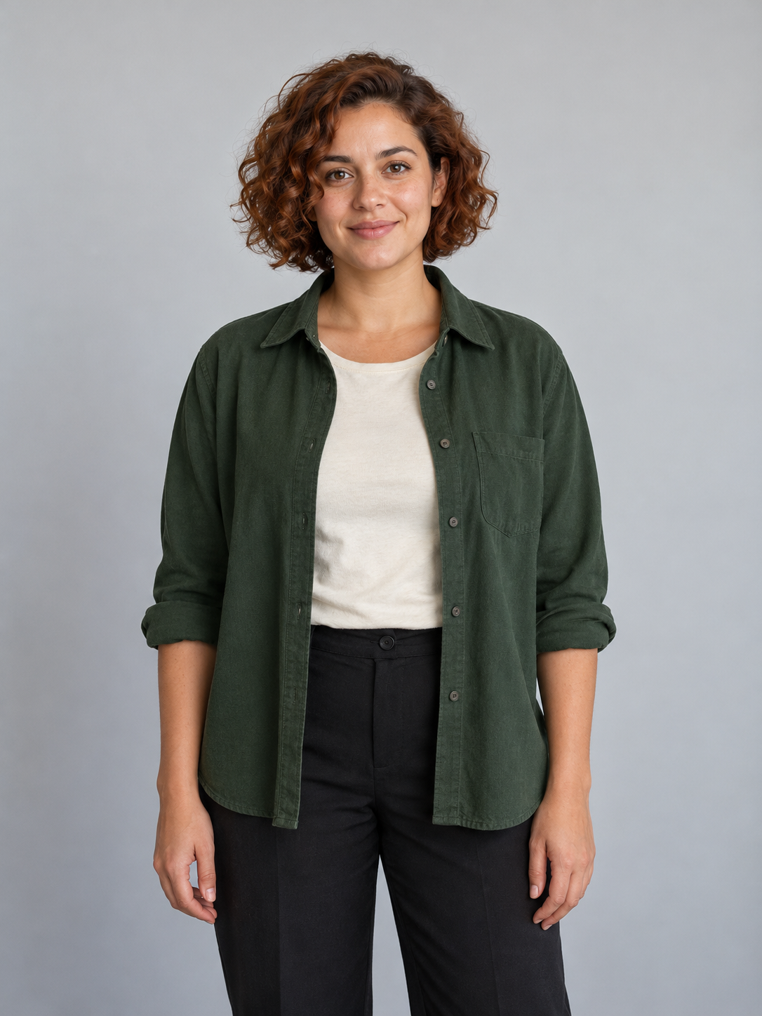 Fictional adult woman with an auburn bob and green overshirt, the right input portrait