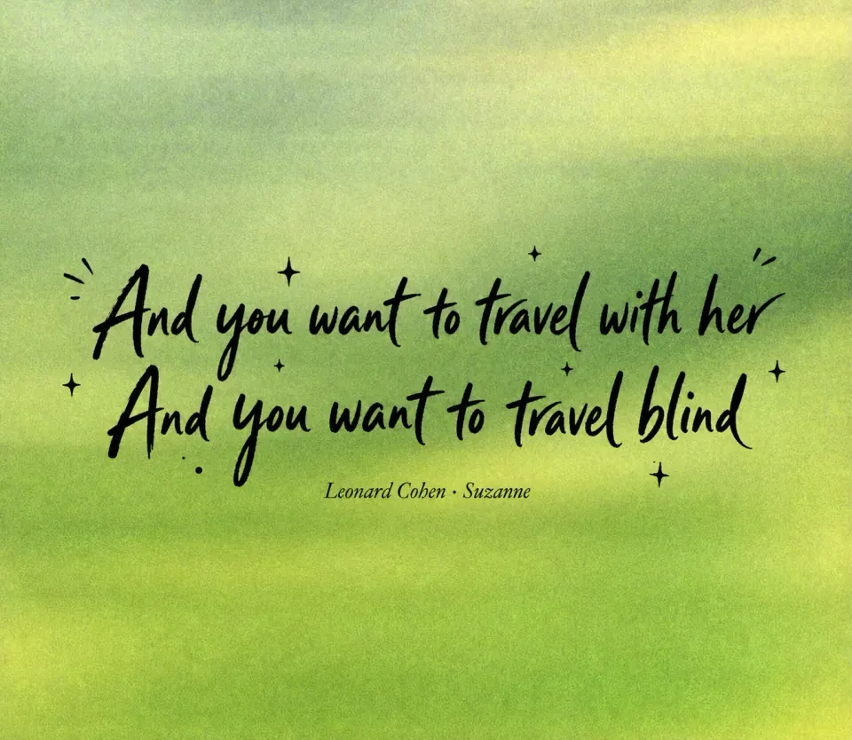 Two lines of black handwritten lettering centered over a softly blurred green landscape