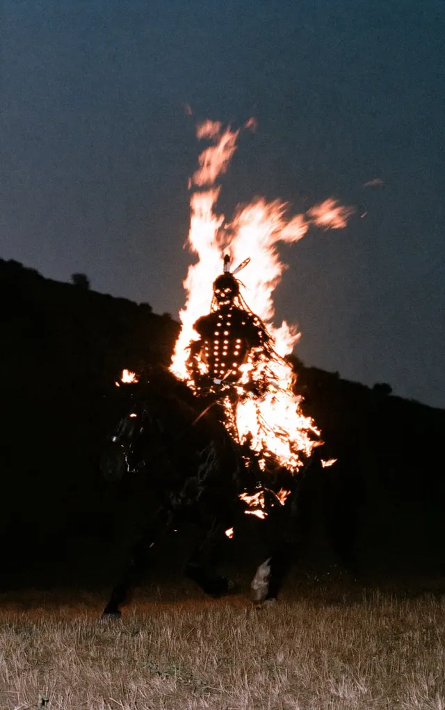 Burning Rider at Dusk. Visual study of dark fantasy, flaming rider, night horse photography
