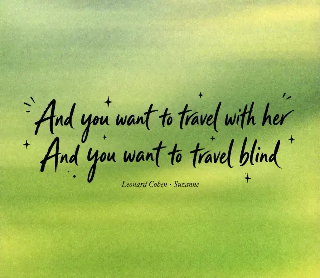 Two lines of black handwritten lettering centered over a softly blurred green landscape